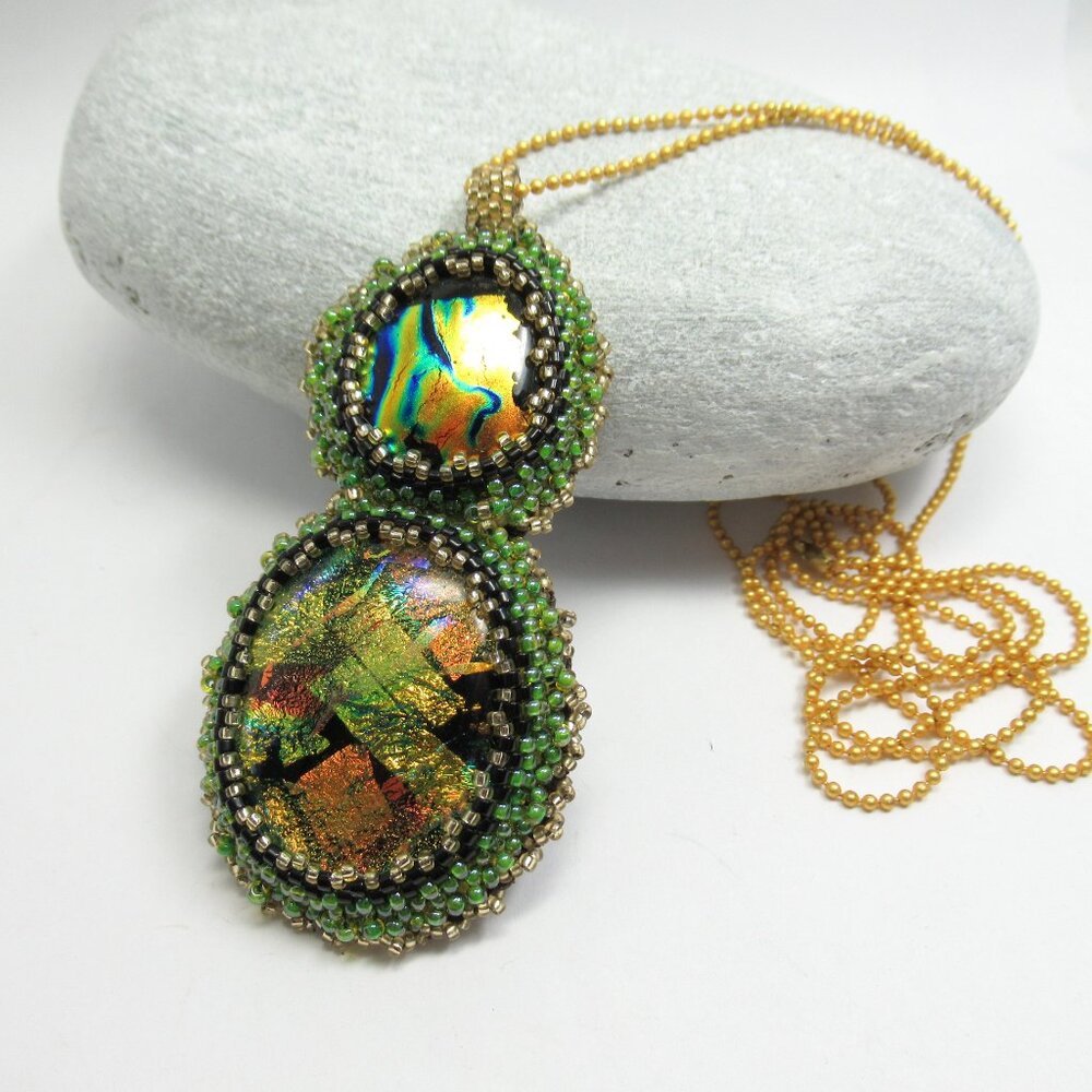 Hand embroidered pendant